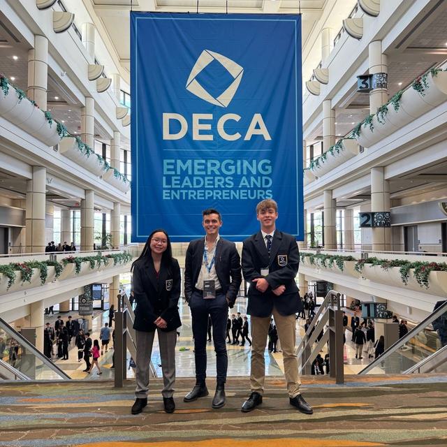 Members beneath the Emerging Leaders and Entrepreneurs banner
